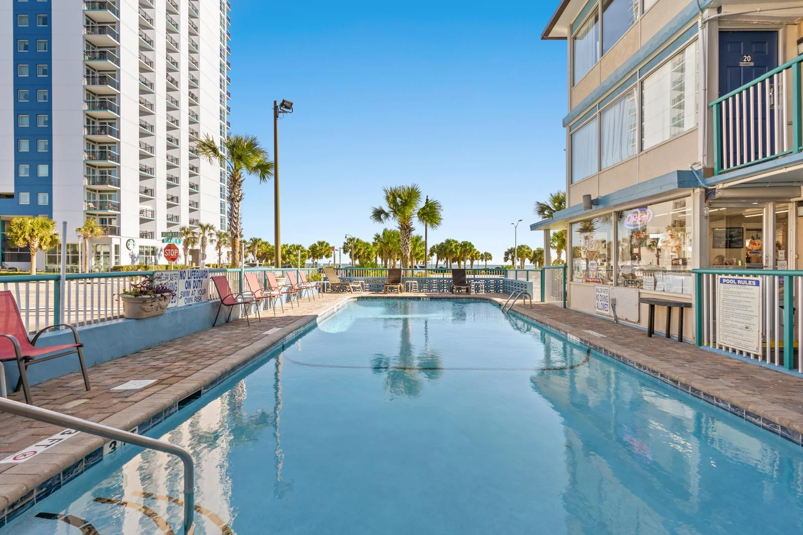 Outdoor pool at Budget Inn by the Ocean